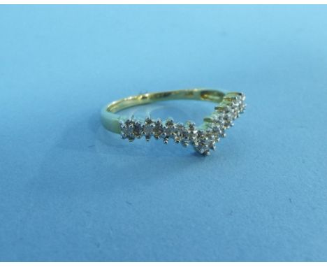 A 9ct gold and diamond wishbone ring