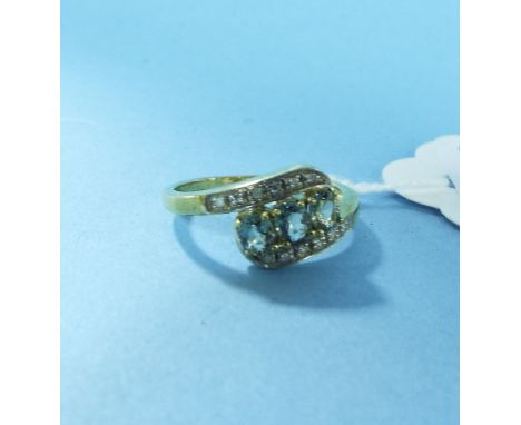 A 9ct gold, green sapphire and diamond ring