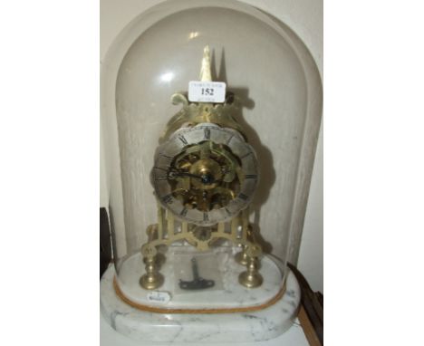 A Victorian brass skeleton clock, the 14 cm diameter silvered chapter ring having Roman numerals, fitted a single fusee movem