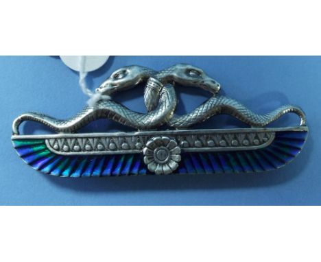 A silver and enamel brooch, in the form of snakes