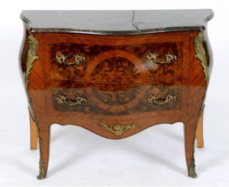 An 18th century style walnut bombé commode, the marble top above two drawers, on cabriole legs, with gilt metal mounts (top r