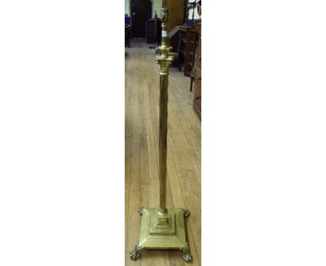 A brass Corinthian column standard lamp
