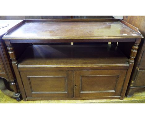 An oak buffet, the three quarter gallery top above a pair of panel doors, 117 cm wide