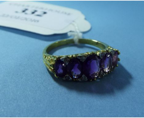A silver, gold plate, amethyst and diamond ring