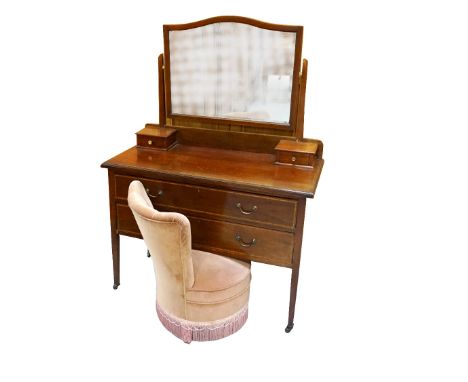 EDWARDIAN MAHOGANY DRESSING CHESTthe shaped bevelled mirror above two jewellery drawers, with two long drawers below, standin