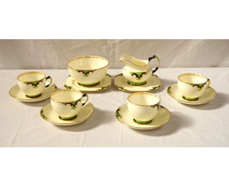 1930's TUSCAN 'PLANT' TEA SERVICEcomprising eleven cups, eleven saucers, twelve side plates, sugar basin and milk jug (36)