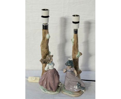 TWO NAO/LLADRO FIGURAL TABLE LAMPSone with girl and dog, the other with girl and basket of flowers, both approximately 30cm h