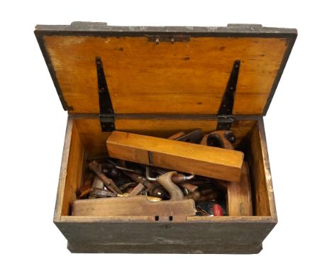 VINTAGE PAINTED PINE TOOL CHESTthe lift up lid with the initials 'J.B.', containing wooden planes, bradles, hand drills, chis