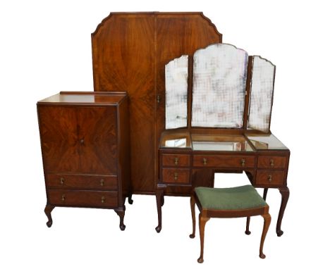 1930's WALNUT BEDROOM SUITEcomprising a double door wardrobe with shaped top, one door with mirrored inner side and marked 'A