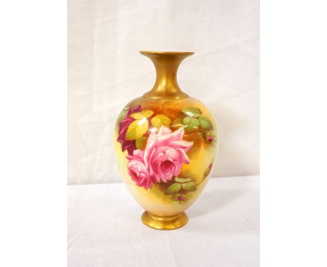 ROYAL WORCESTER VASE
of ovoid form, decorated with roses, with a gilt neck and foot, signed F. Harper, 17cm high 