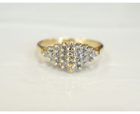 DIAMOND CLUSTER RINGon eighteen carat gold shank, the diamonds totalling approximately 0.25cts, ring size K-L