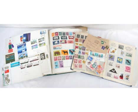 TWO STAMP ALBUMScontaining a selection of First Day Covers from the 1960's, early British, Commonwealth and world stamps incl