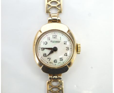 LADIES NINE CARAT GOLD CASED ROTARY WRISTWATCHthe mother of pearl dial with Arabic numerals, with Swiss made 15 jewel movemen