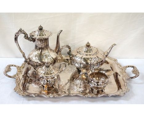 DECORATIVE VICTORIAN STYLE TEA SERVICEwith embossed floral decoration, comprising teapot, hot water jug, sugar basin, milk ju