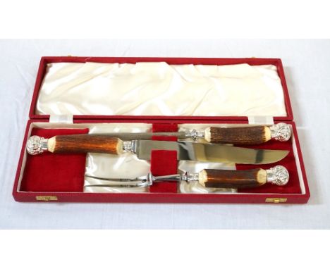 CASED THREE PIECE CARVING SETwith antler handles comprising knife, fork and steel 