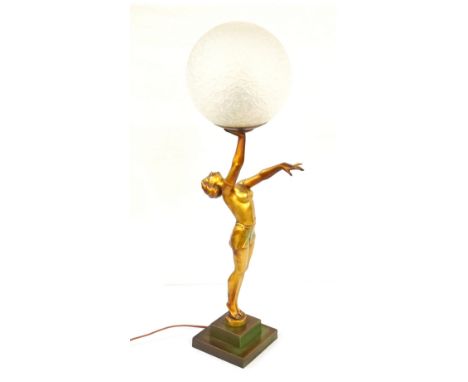 ART DECO FEMALE FIGURAL TABLE LAMP
the standing figure with her head tilted back and holding the light aloft with one hand, r