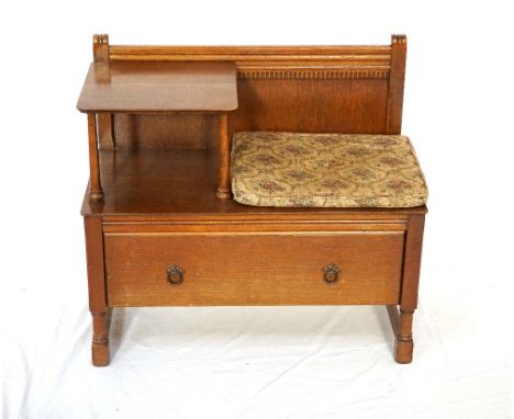 VINTAGE OAK TELEPHONE SEATwith upper panel raised on turned supports and removable padded seat, above a single drawer, raised