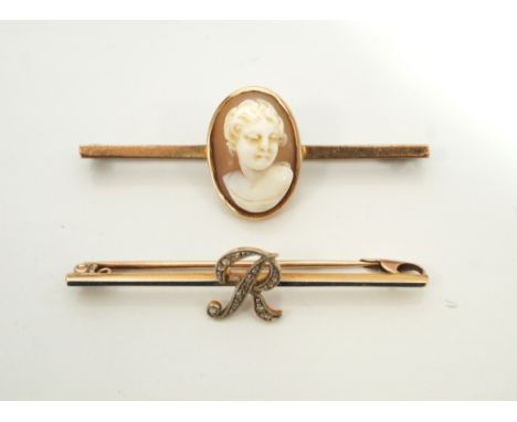 DIAMOND SET UNMARKED GOLD BAR BROOCHthe diamonds set within a letter 'R'; together with a cameo set bar brooch in rolled gold