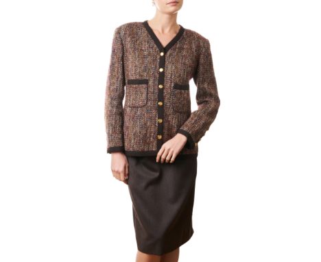 CHANEL VINTAGE BROWN TWEED SKIRT SETCondition grade B+.Size French 40. Jacket 90cm chest, 65cm length, skirt 76cm waist, 55cm