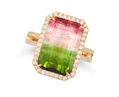 A WATERMELON TOURMALINE AND DIAMOND DRESS RING in 18ct yellow gold, set with an octagonal step cut watermelon tourmaline of 9