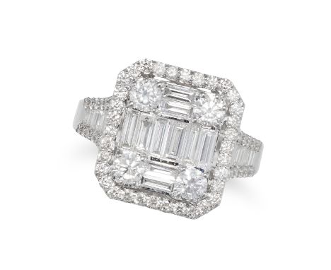 A DIAMOND CLUSTER RING in 18ct white gold, illusion set with a cluster of round brilliant and baguette cut diamonds, the shou