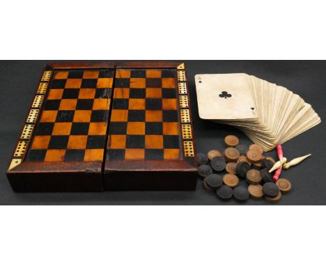 A Victorian inlaid wood and ivory travelling draughts/cribbage game board, with a pack of cards, four turned bone cribbage pi