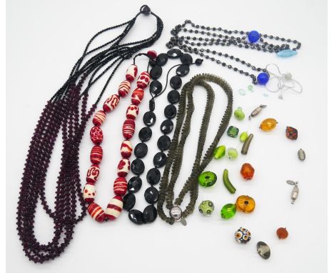 A collection of seven Murano and lamp work glass bead necklaces. Including three SENT, Murano glass bead necklaces, one with 