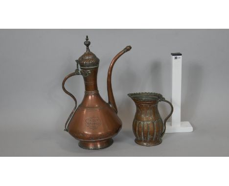 An 18th century copper samovar and vintage gadrooned copper jug. The samovar has a snake form handle and is impressed '1798',