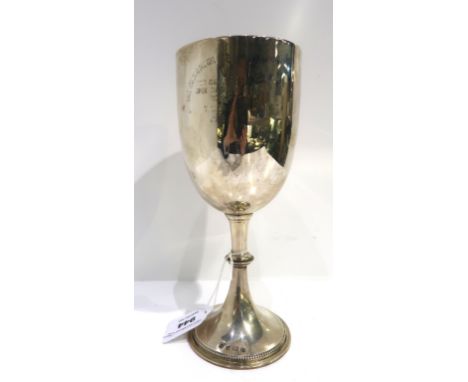 A silver presentation goblet, Birmingham 1912. of cylindrical form with knopped stem inscribed " The South Pampa Tarapaca Gol