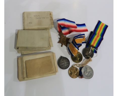 A lot comprising a WW1 group of three to Pte. T W Wilson R Scots, a Long Service medal to 9018 Sjt. J R Paterson 3/ Lanark V 