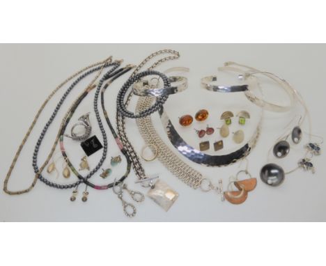 A planished silver torc necklace, matching bangles, a Norman Cherry ring, Ortak enamelled earrings etc Condition Report: Not 