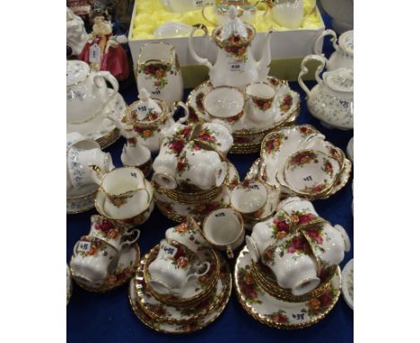A Royal Albert Old Country Roses tea and coffee service comprising cups, saucers, plates, coffee pot, small teapot, sugar bow