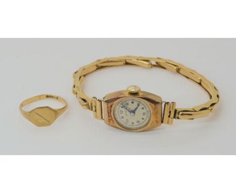 A 9ct ladies Rotary watch and strap and a 9ct signet ring size M1/2, weight combined without movement 9.7gms Condition Report