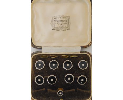 A boxed set of 9ct onyx and pearl cufflinks, buttons and a stud, weight combined 9.9gms Condition Report: Available upon requ