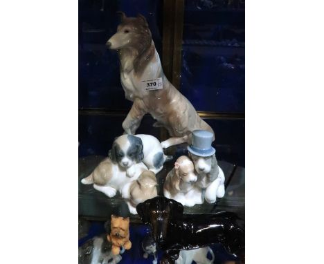 A large Lladro model of a Collie 6455, together with two Nao puppy groups and two other figures Condition Report: small resin