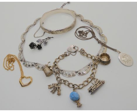 A silver collar necklace, bangle, charm bracelet etc Condition Report: Not available for this lot