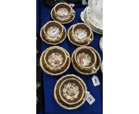 Six blue and gilt handpainted tea cups and nine trembleuse saucers with central scenes of ruins and castles, 4062 Condition R