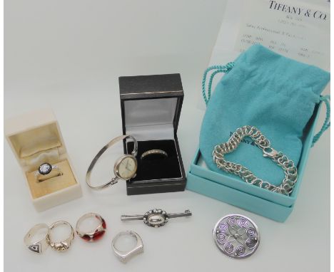 A silver Tiffany &amp; Co double heart bracelet, (with Receipt from flagship store in New York) a 9ct clear gem full eternity
