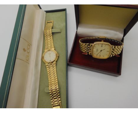 A gold plated Gucci watch, number 0034863, in original box, together with a gold plated gents Rotary watch Condition Report: 