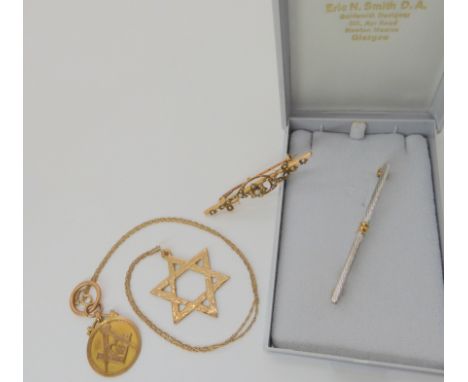 A 9ct Eric Smith brooch, star of David and Masonic medallion, weight combined 10.8gms, and a 15ct gold pearl set brooch weigh