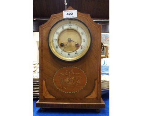 An inlaid mantle clock with enamel chapter ring Condition Report: Available upon request