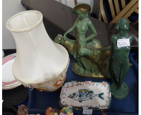 A lot comprising a painted plaster figure of a nude, another of a woman and greyhounds, a Clarice Cliff relief moulded lamp b