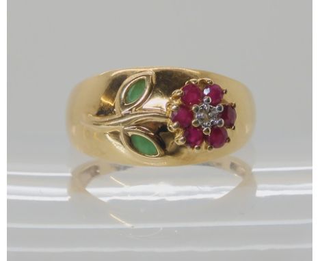 A 9ct gold QVC emerald, ruby and diamond set flower ring, size S, weight 4.6gms Condition Report: Available upon request