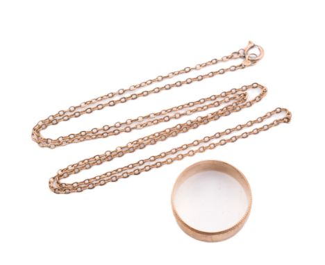 A hallmarked 9ct gold band ring and a 9ct gold chain necklace. The lot to include a hallmarked 9ct gold band ring with engine