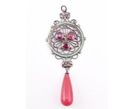 An Arts and Crafts silver pendant. The Arts and Crafts silver pendant set with three collet set round cut garnets surrounded 