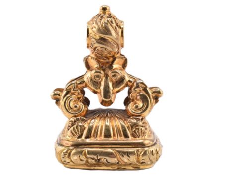 A 19th-century carnelian seal fob with stag intaglio. The antique seal fob having a fox head decoration with scrolling, folia