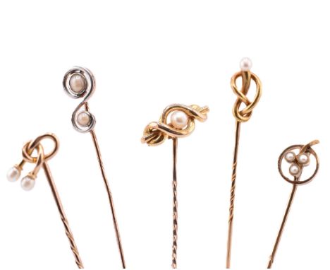A collection of 15ct gold and 9ct gold stick pins. The stick pins to include four 15ct gold and pearl stick pins and one 9ct 