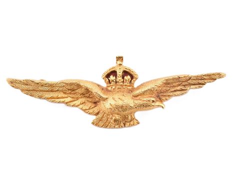 A gold and enamel RAF sweetheart brooch pin. The brooch in the form of an eagle surmounted by crown with red enamel decoratio