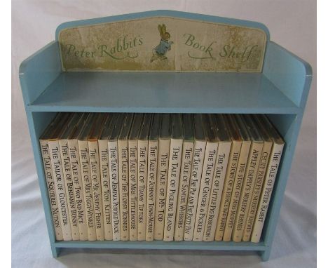 Miniature vintage Peter Rabbit's book shelf H 29 cm containing 23 Beatrix Potter books published by Frederick Warne &amp; Co 