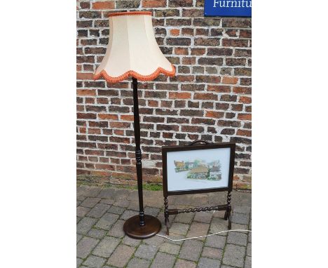 Standard lamp and a fire screen